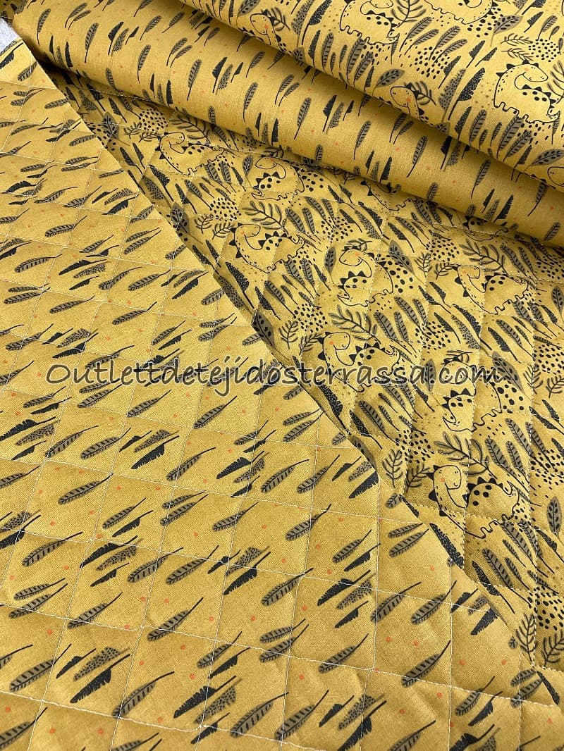 Acolchado reversible Dinosaurios y plumas