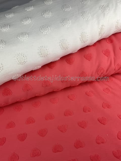 French Terry finito con relieve Corazones y Soles